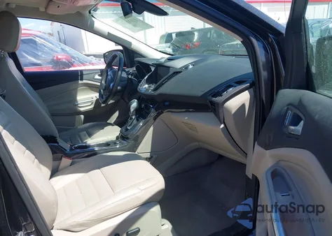 2015 Ford Escape Titanium z USA, uszkodzony, nr VIN 1FMCU0J91FUB36973